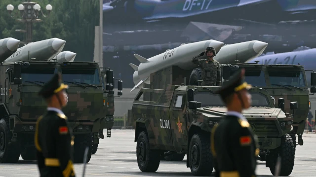 Çin’den dünyaya gözdağı: Dev gösteride füze tank ve İHA’larla mesaj verildi