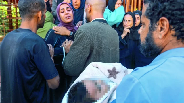 Annesinin kucağında kurşunladılar